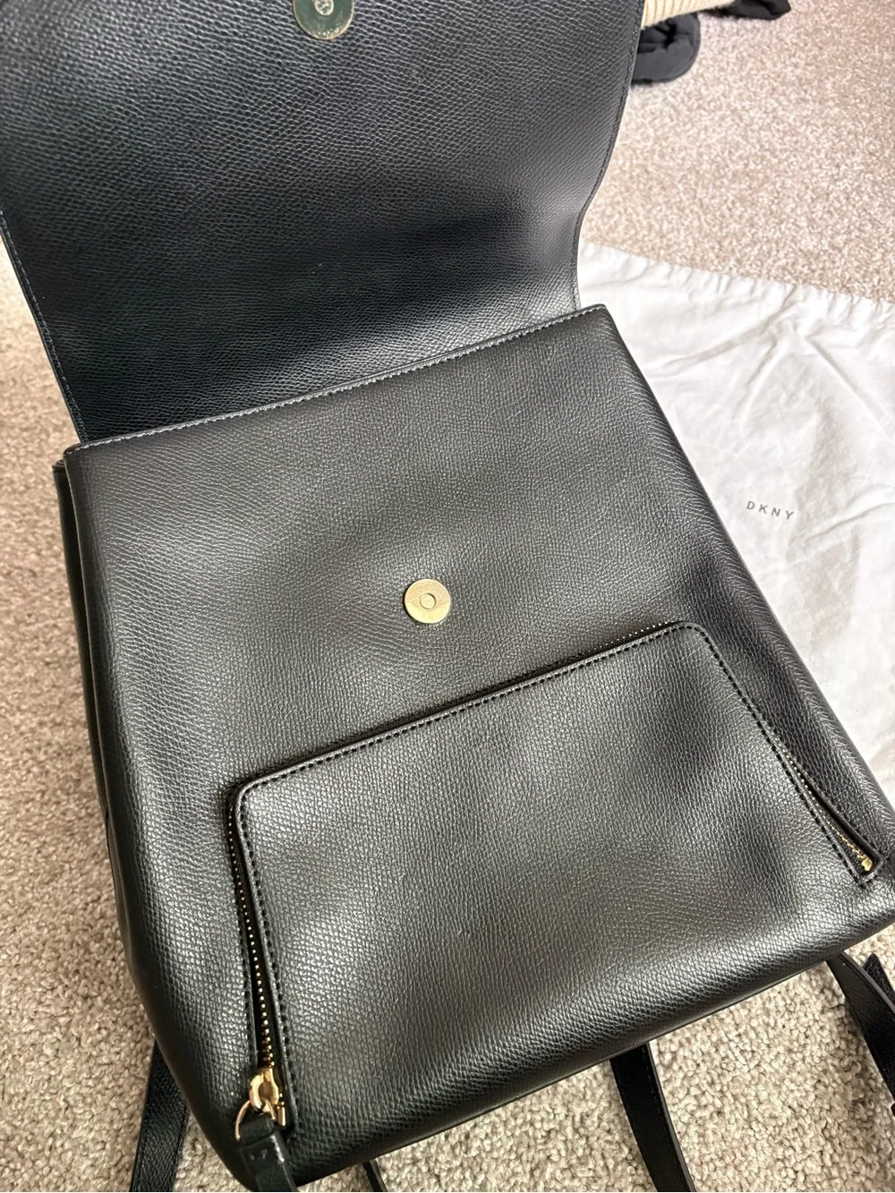 DKNY Black Leather Backpack with Gold Accents
